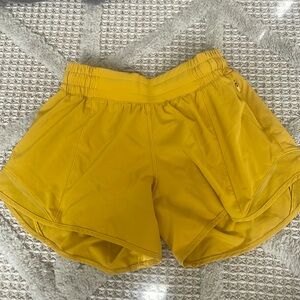 Lululemon, size 2, mustard yellow color, exercise shorts